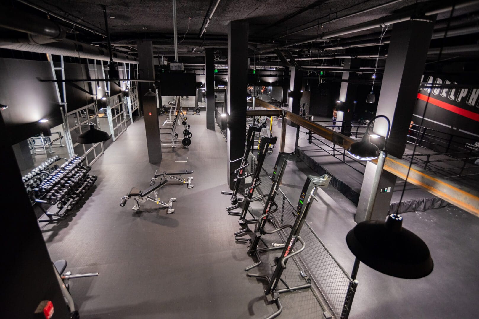 A series of gym equipment in the white spotlight