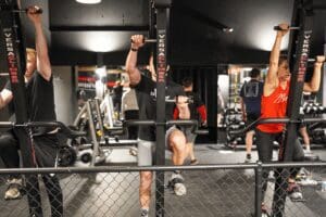 A group of people working out at the gym